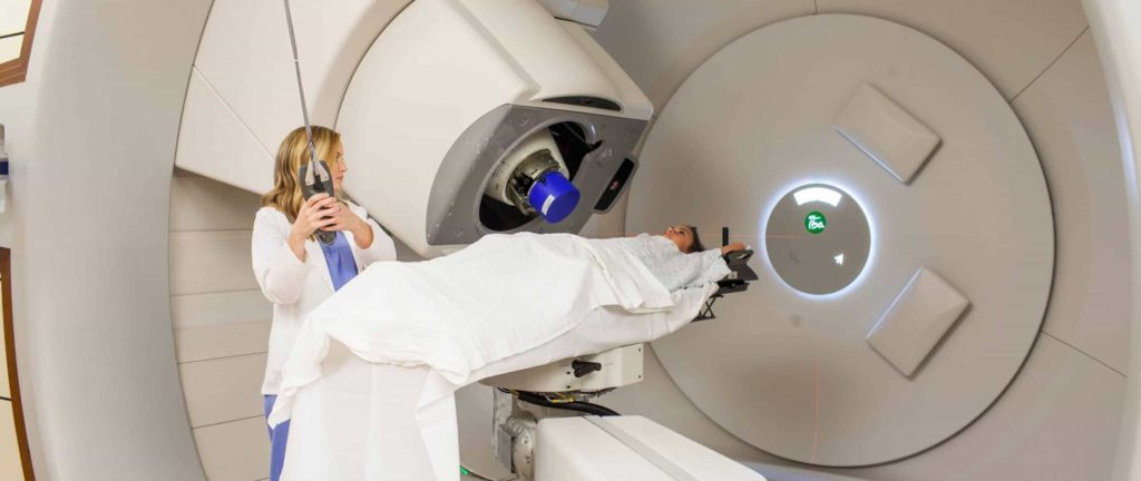 Woman and patient doing a machine