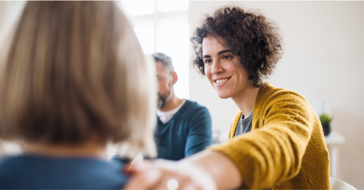 Woman Encouraging Another Woman