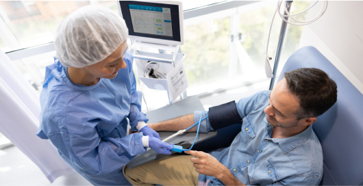 Nurse Helping Patient